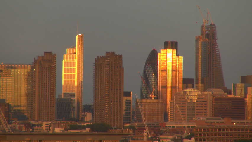 City of London with business skyscraper building at sunset, tower 30 St Mary Axe in golden light, London UK Royalty-Free Stock Footage #5670641