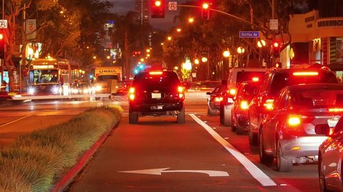 Night traffic on the corner of Santa Monica Blvd and Fairfax Avenue in West Hollywood,California