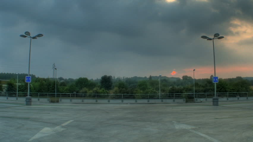 Sunset over parking lots, HD time lapse clip, high dynamic range imaging