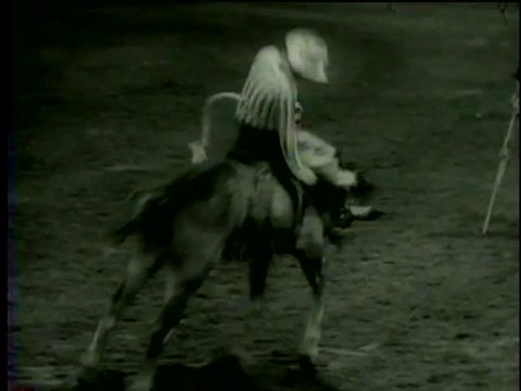  A horse rider on horse back falls during his performance at Santa Rosa Roundup PRCA Rodeo in Vernon, TX circa 1958 - MGM PICTURES, UNIVERSAL-INTERNATIONAL NEWSREEL, USA, filmed in 1958
