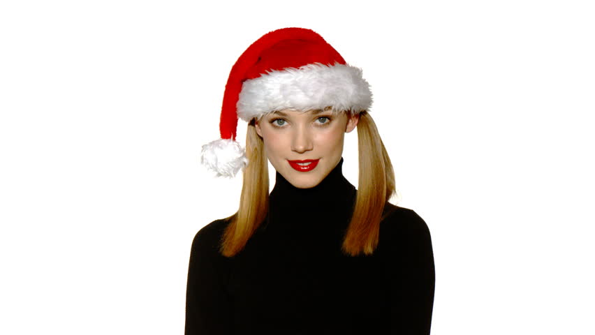 Sexy girl in santa claus hat with shopping bag 