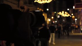 photographer takes picture of a crowded street at night 2