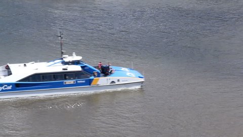 BRISBANE, AUSTRALIA - February 19 2014: The city cat ferry service began in 1996 and now has 13 vessels. Named after Aboriginal place names they are popular with tourists on the Brisbane River.