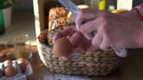 Female hand cracking egg with knife, super slow motion, shot at 240fps
 - Powered by Shutterstock - Get 15% off with code: PIKWIZARD15