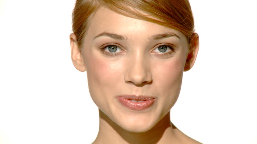 Portrait of beautiful and sexy woman is doing makeup 