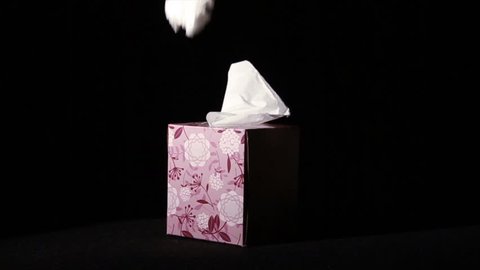 Pulling Tissues from Box in Slow Motion