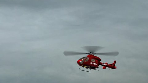 Air Rescue Helicopter fly  in stormcloud and lightning