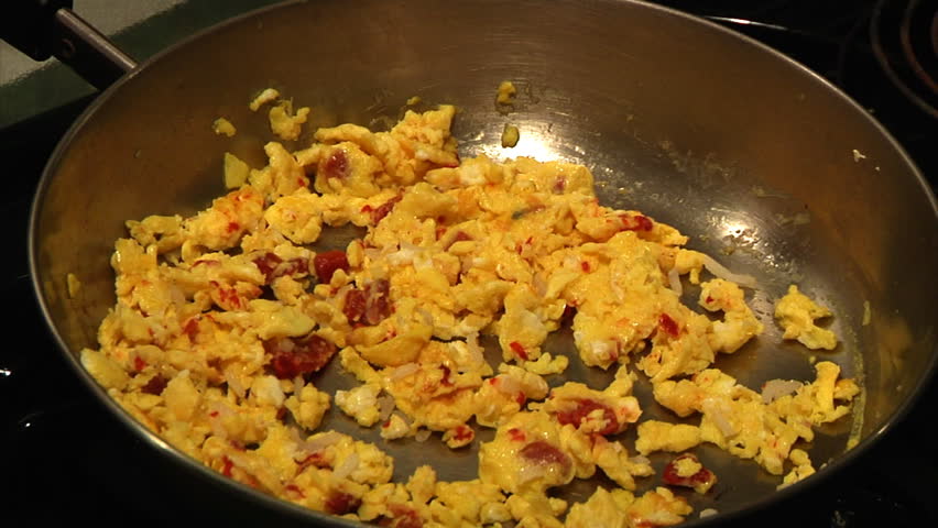 Frying eggs.