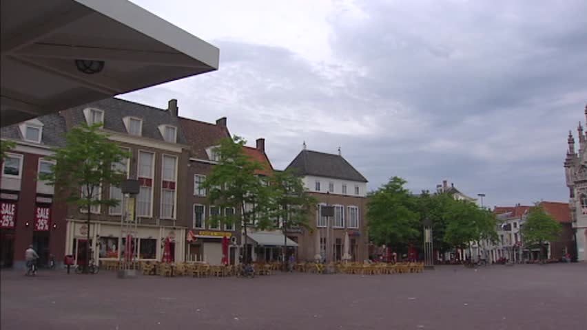 MIDDELBURG, THE NETHERLANDS: market square + pan medieval city hall, built in 1452 + zoom in turrets.  Today the former city hall serves as the Roosevelt academy