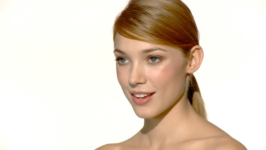 Portrait of beautiful and sexy woman is doing makeup 