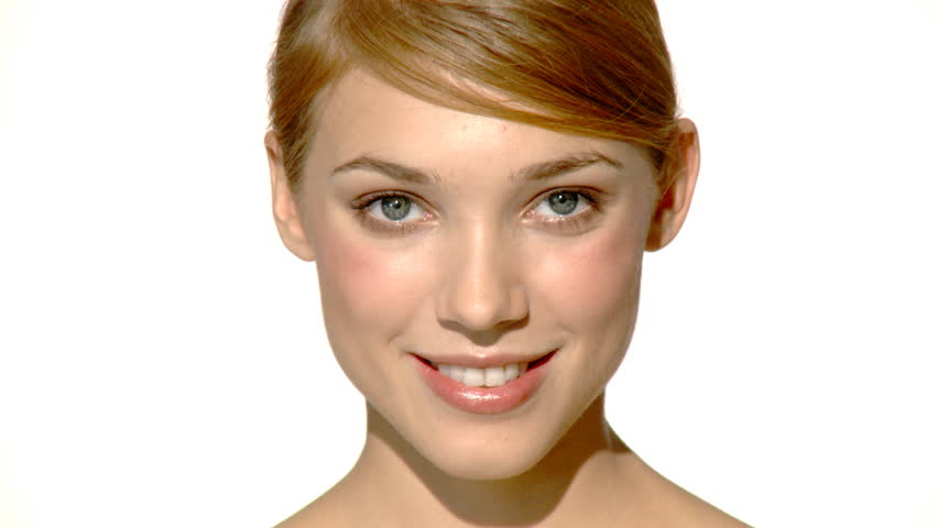 Portrait of beautiful and sexy woman is doing makeup 