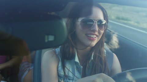 Teen Driver Sings Along To Car Radio