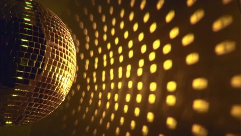 Gold disco ball effect and reflection on the wall, loop-ready, HD 1080i
