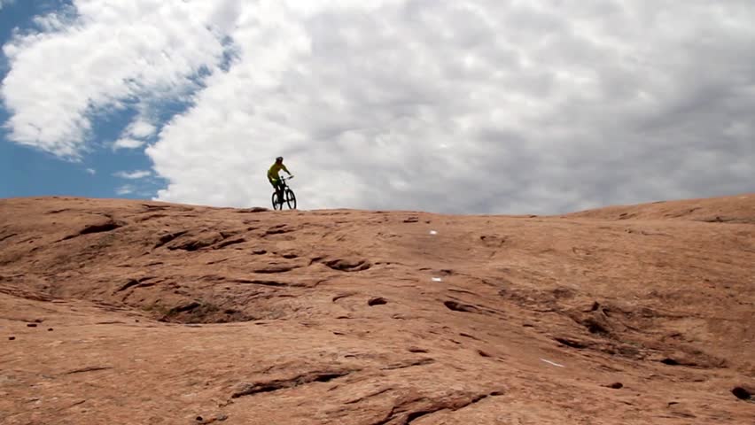 Mountain biker at the Slickrock trail in Moab, Utah