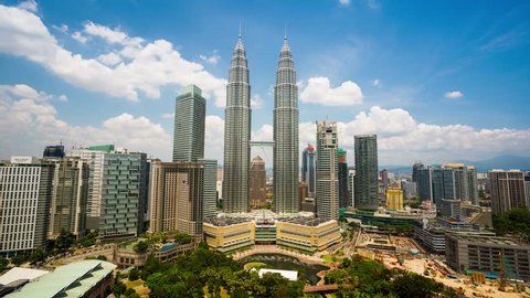 KUALA LUMPUR, MALAYSIA -  CIRCA FEB 2014: 4K timelapse, cloudscape view of the Petronas Twin Towers and Kuala Lumpur City Center. Super high quality, 4k resolution (4096x2304).
