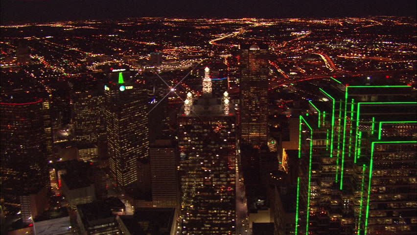 Lights Dallas Skyline. Bright Dallas City lights shining through the night.