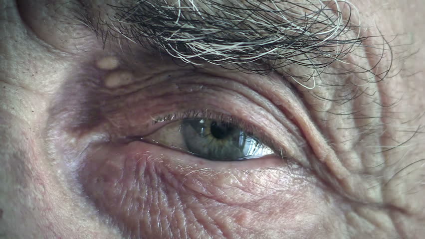 macro of an blue eye of an old man Royalty-Free Stock Footage #5744867