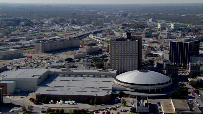 Dallas Texas Skyline Buildings. Several high rise buildings on the Dallas, Texas skyline, accompanied by a parking lot below.