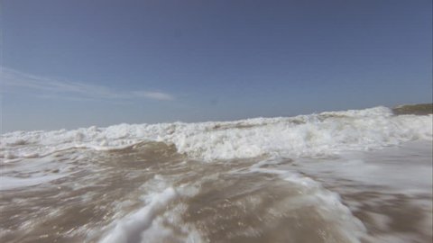 waves breaking on a beach