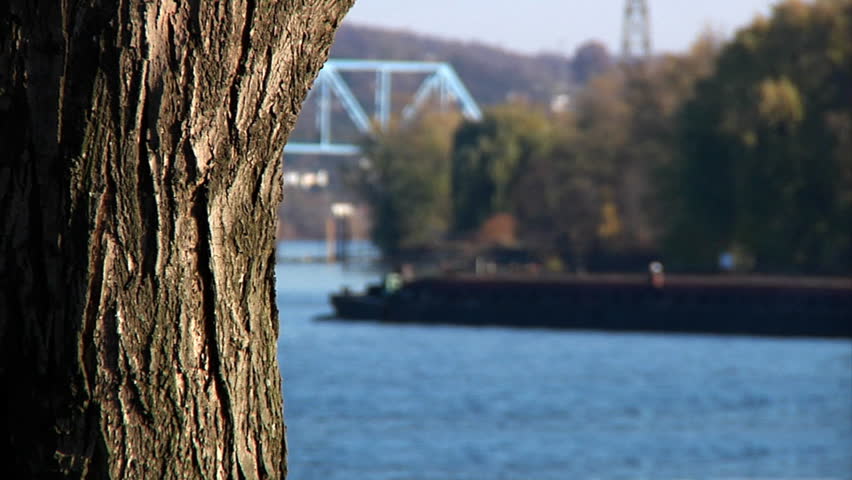 A coal barge travels up the Ohio River.