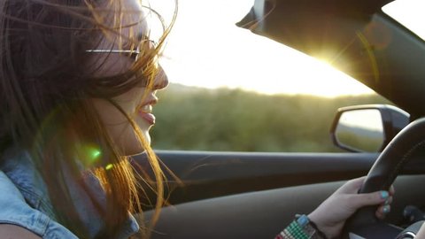 Profile Of A Beautiful Teen, Driving In Desert At Sunset
