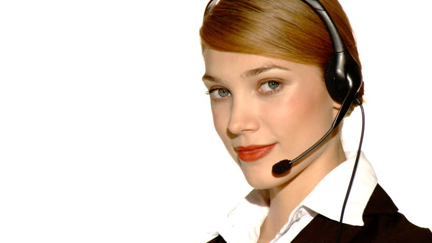 Beautiful young businesswoman is wearing headset 