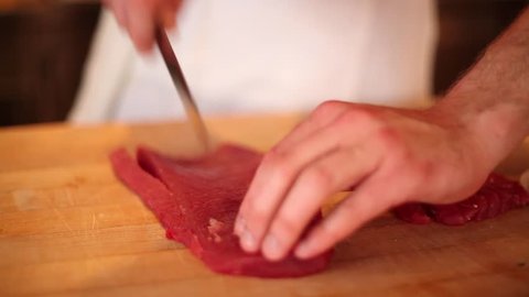 Cutting raw ahi for sushi
