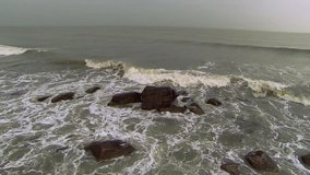 Rocks in the Sea. Caspian Sea. Storm. Russia. Makhachkala. The Republic of Dagestan. Aerial video.