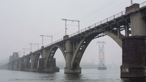 Railway Bridge In The Morning Fog
