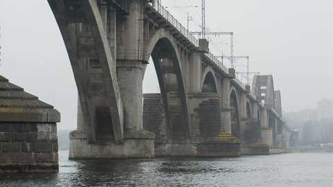 Railway Bridge In The Morning Fog. Merefa-Kherson Bridge In Dnepropetrovsk