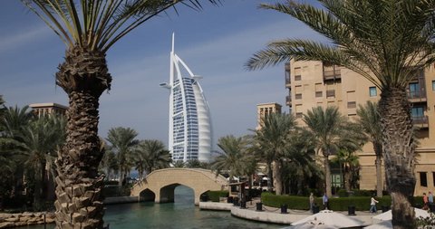 DUBAI, UNITED ARAB EMIRATES, UAE - JANUARY 20, 2014 Burj Al Arab Madinat Jumeirah Dubai, People Tourists Tour Boat Visit in Vacation ( Ultra High Definition, Ultra HD, UHD, 4K, 2160P, 4096x2160 )