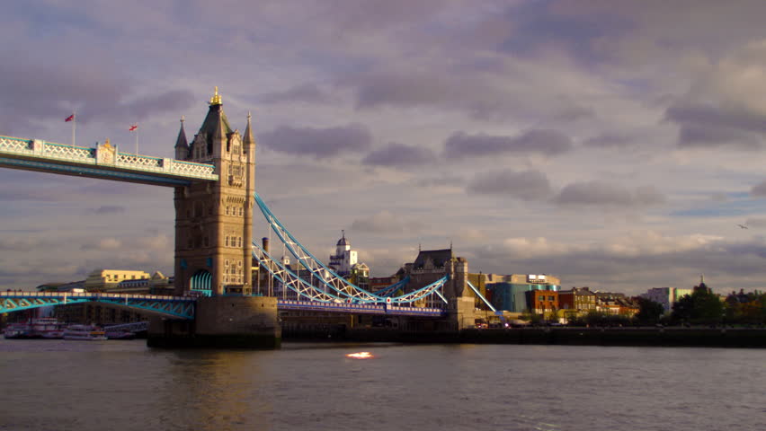 Panning view of Tower bridge and River Thames in London, England