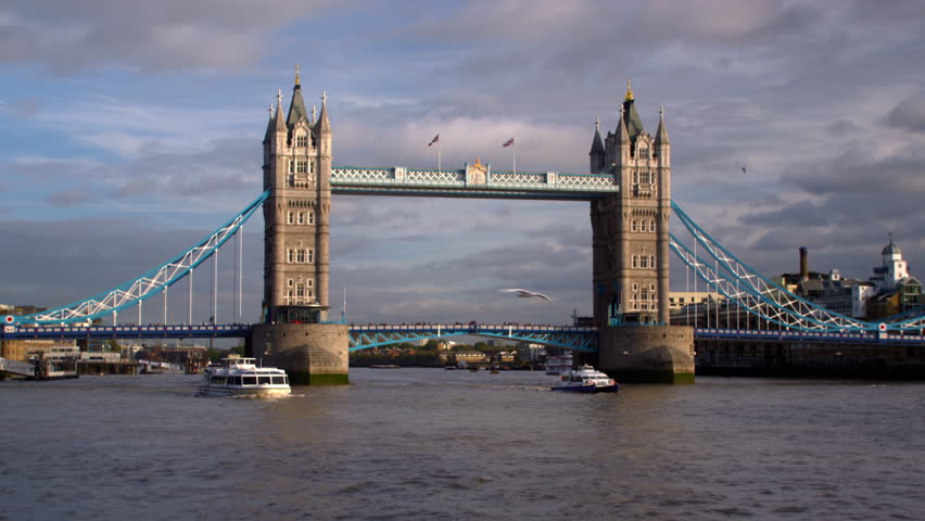Two boats in front of Tower Bridge in London, England