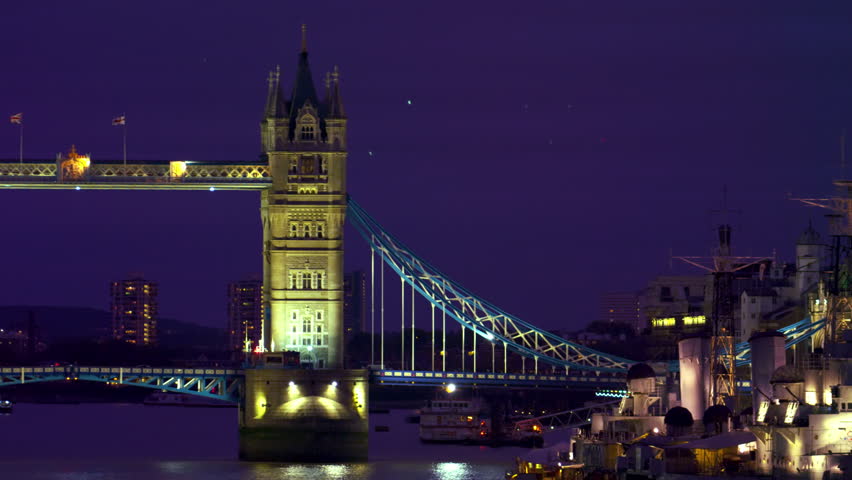 Lit Tower Bridge in darkness