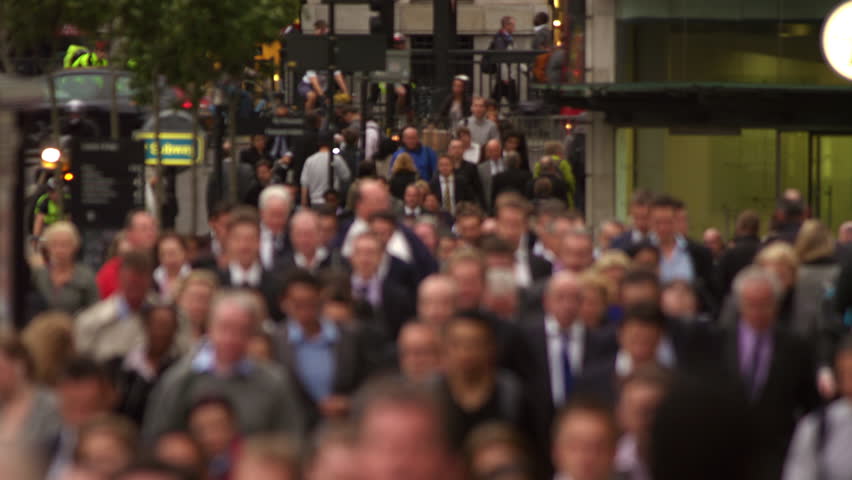 Business people on a busy street in London