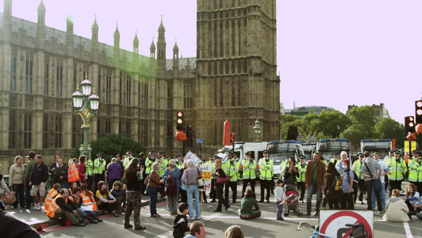 LONDON, UK - OCTOBER 9, 2011: Protesters and unidentified policemen near Big