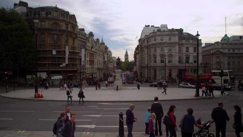 LONDON, UK - OCTOBER 9, 2011: Street traffic on a roundabout close to Trafalgar