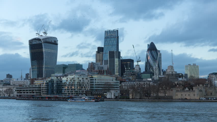 The City of London Financial District, London, England. A day to night transition time lapse. Towers include 20 Fenchurch Street known as the Walkie Talkie and 30 St Mary Axe known as the Gherkin. Royalty-Free Stock Footage #5792195