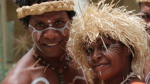 NOUMEA, GRANDE TERRE/NEW CALEDONIA - FEBRUARY 06, 2014: Unidentified Kanak people of Noumea, New Caledonia posing for tourist photographs