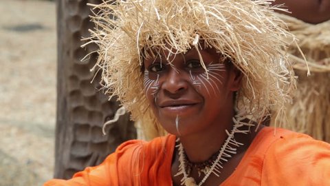 NOUMEA, GRANDE TERRE/NEW CALEDONIA - FEBRUARY 06, 2014: Unidentified Kanak woman of Noumea, New Caledonia posing for tourist photographs