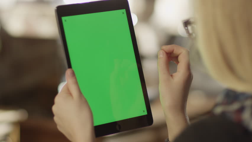 Girl Using Tablet PC with Green Screen. Shot on RED Digital Cinema Camera in 4K (ultra-high definition (UHD)), so you can easily crop, rotate and zoom.
Easy for tracking and keying.
ProRes HQ codec.
 | Shutterstock HD Video #5793365