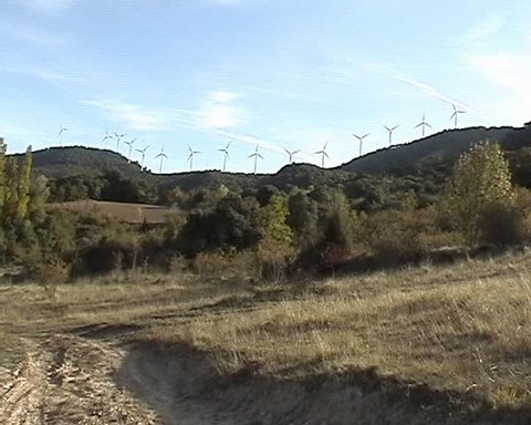 Mountain landscape with wind farms.