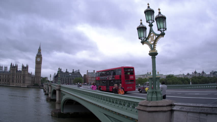 LONDON, UK - OCTOBER 11, 2011: Left panning view of people on Westminster Bridge