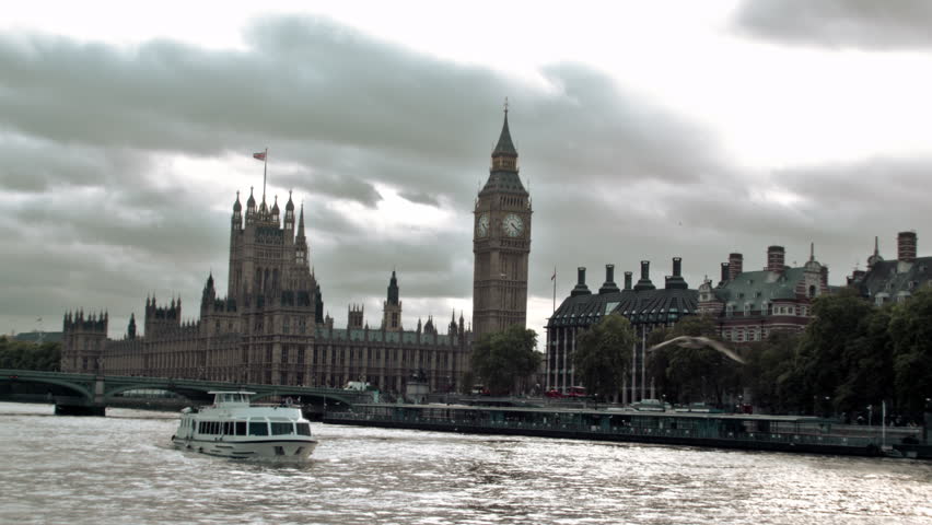 LONDON, UK - OCTOBER 11, 2011: Numerous birds over Thames river with Big Ben in