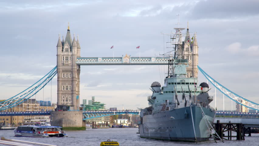 LONDON, UK - OCTOBER 11, 2011: Big ship passes under Tower bridge in London,