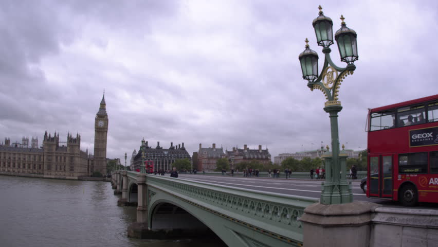 LONDON, UK - OCTOBER 11, 2011: Downward panning view, people cross Westminster