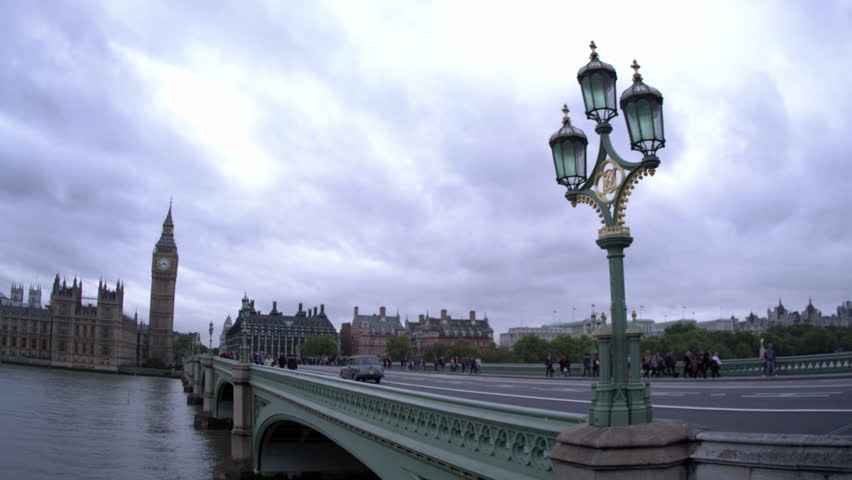 LONDON, UK - OCTOBER 11, 2011: Unidentified people on Westminster bridge,