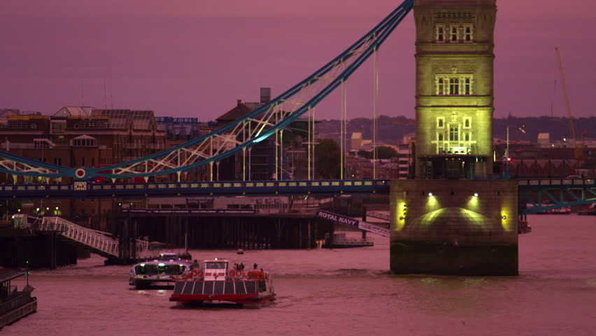 LONDON, UK - OCTOBER 10, 2011: Tower Bridge sunset with boats