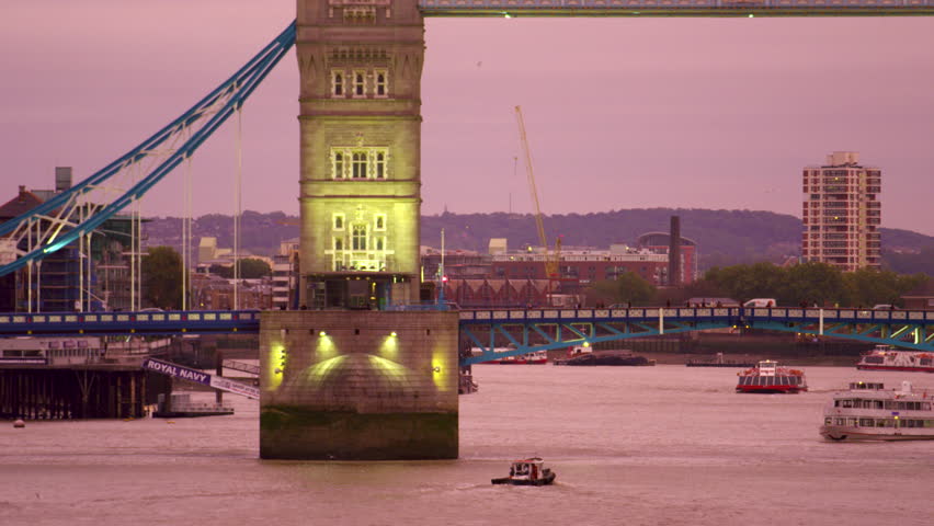 LONDON, UK - OCTOBER 10, 2011: Boats and Tower Bridge