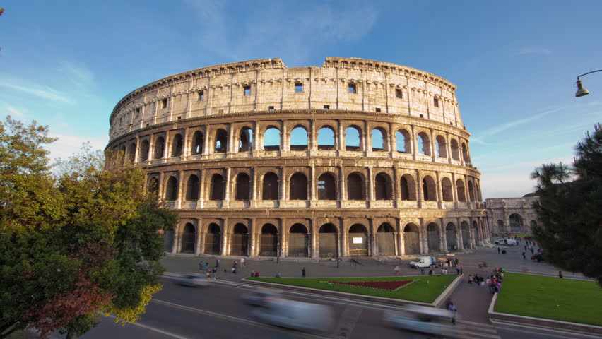 Daytime time-lapse of the Colosseum and street traffic